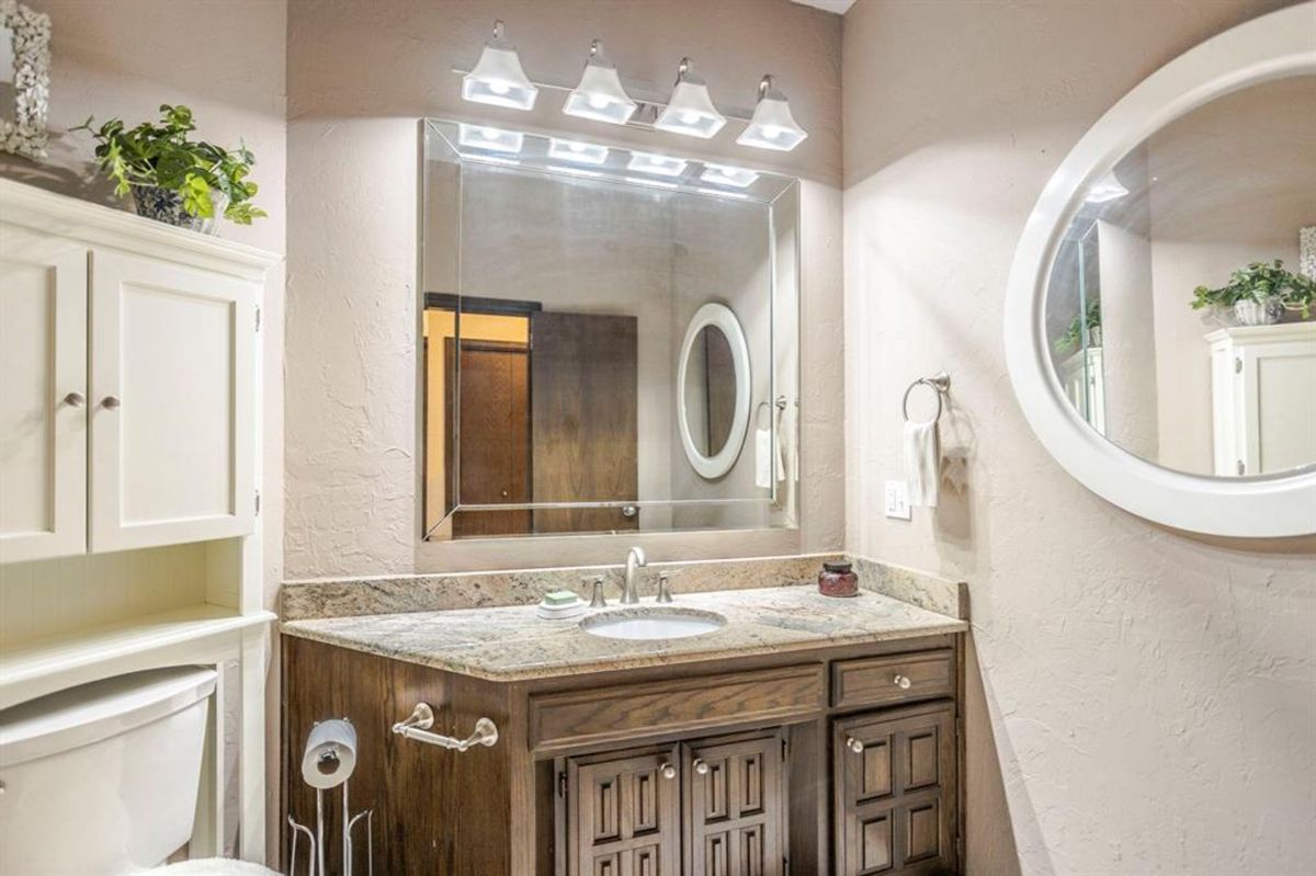 Bathroom showcasing a granite countertop