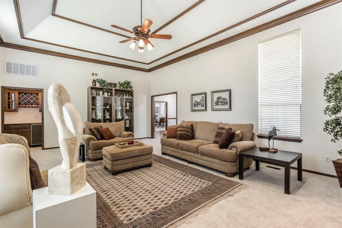 Open living space with elegant ceiling details.