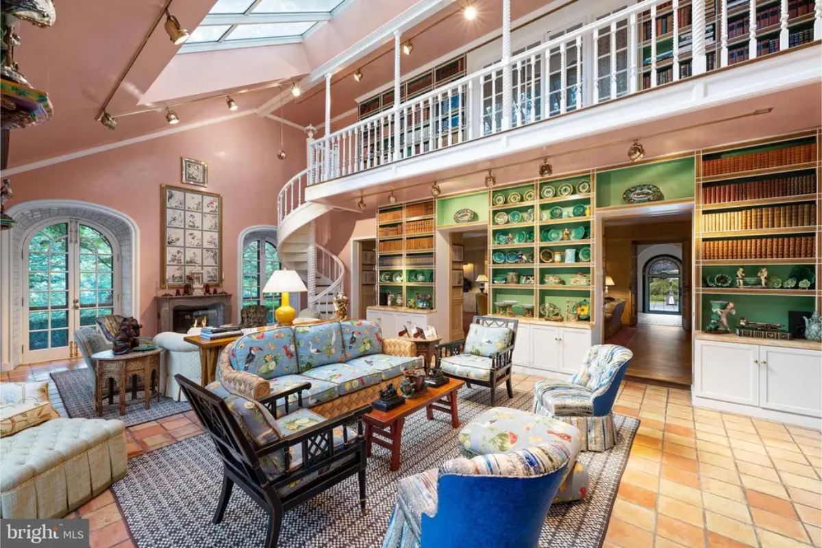 Pink-walled interior and a large skylight flooding the area with natural light.