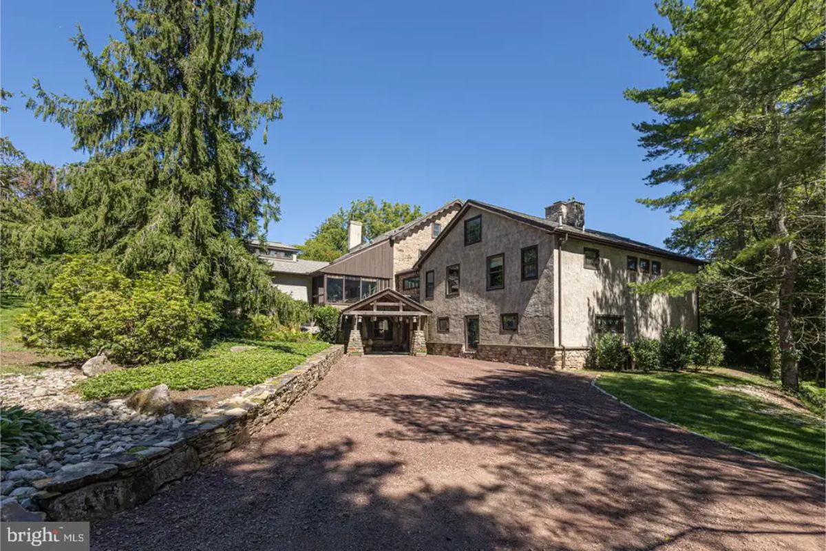 Stone exterior reflects the property's origins as an 18th-century gristmill, later converted into a residence.