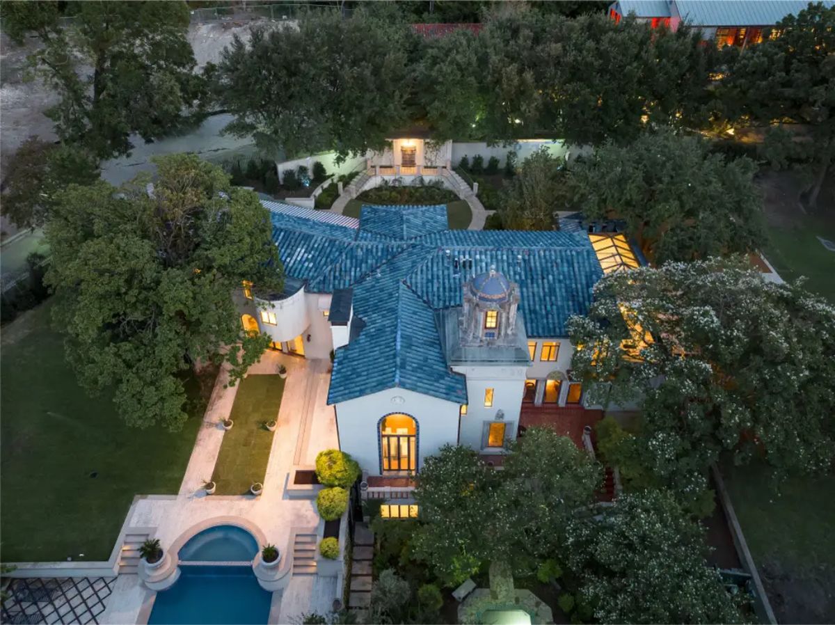 Historical Mediterranean estate built in 1926 spans 6,650 sq. ft. on 2.12 acres overlooking Turtle Creek.