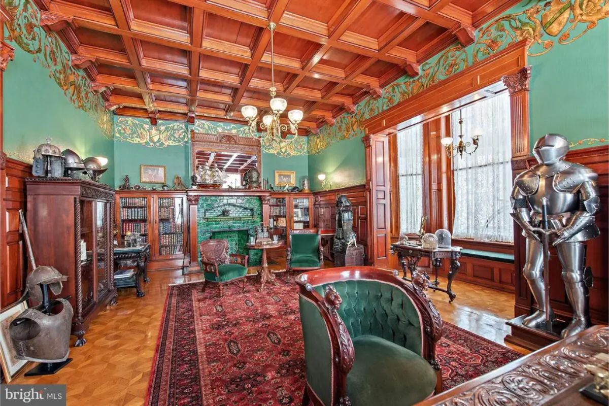 A coffered wood ceiling and intricate wood paneling throughout the space.