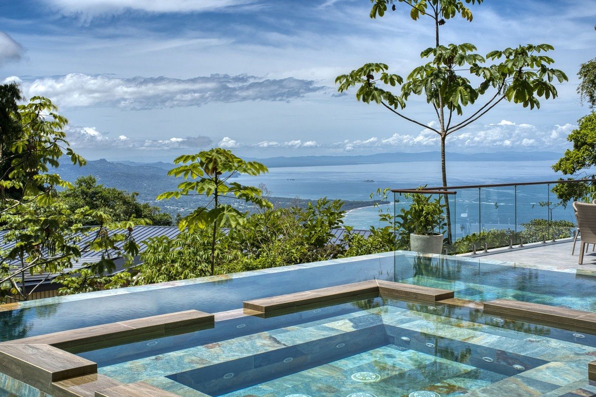 Infinity pool has ocean view.