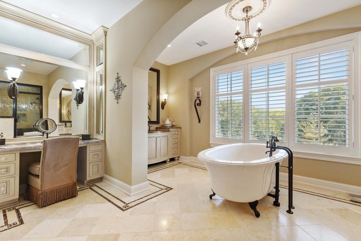 Bathroom suite luxurious bathroom with a freestanding tub, vanity, and large windows.