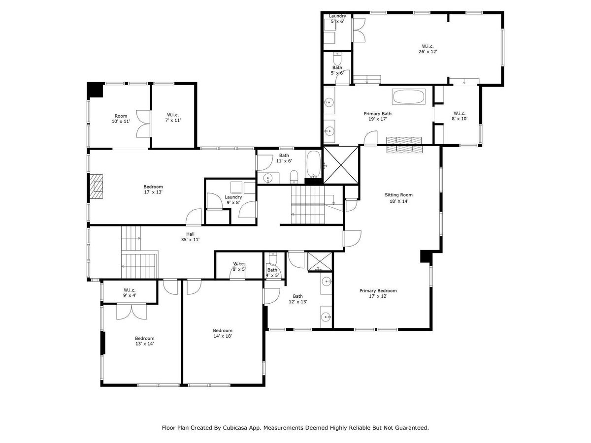 Floor plan depicts a home's upper level, showcasing multiple bedrooms, bathrooms, and walk-in closets.