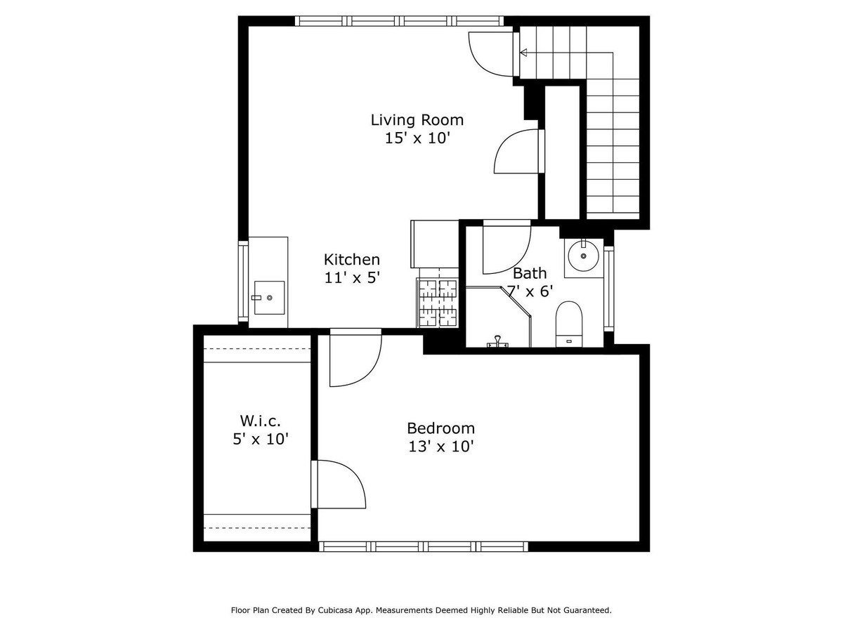 Floor plan shows a small apartment with a living room, kitchen, bedroom, and bathroom.