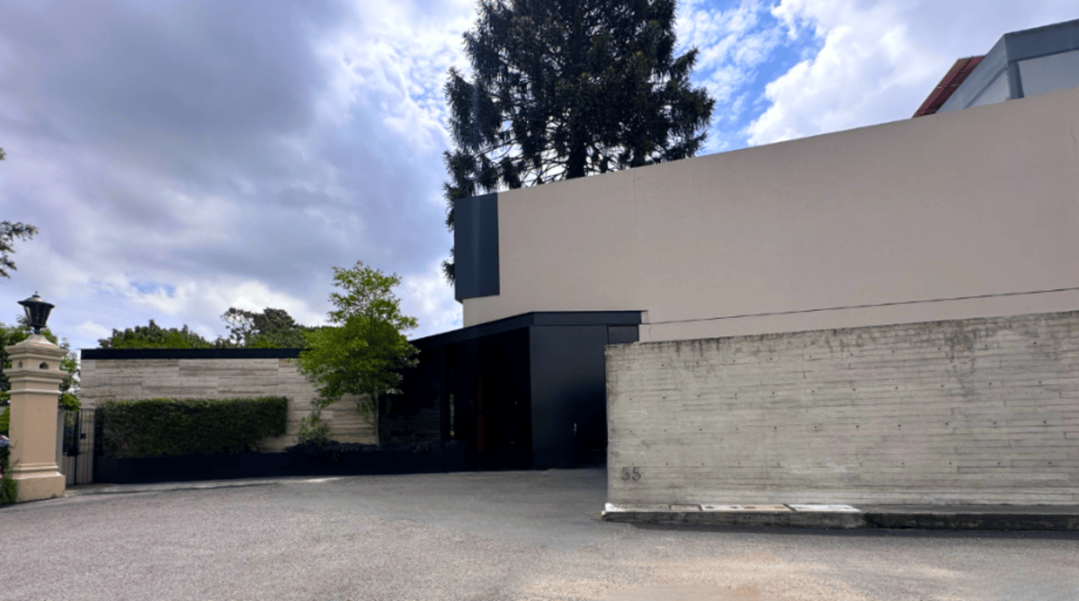 Wide-angle view of a contemporary building with clean lines and geometric design.