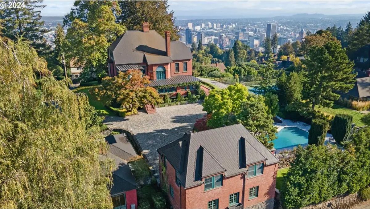 Located in Portland's West Hills, this 9,831 sq. ft. residence sits on 1.17 acres of landscaped grounds with views of the city, river, and mountains.